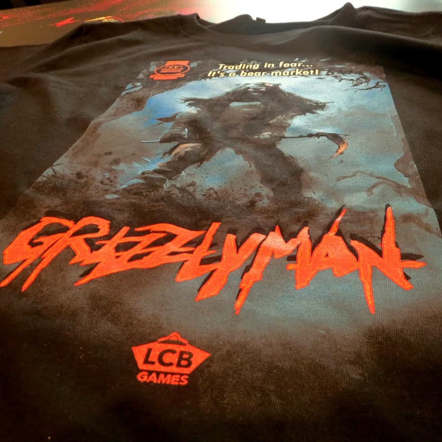Close-up of the Grizzlyman print with the LCB Games logo