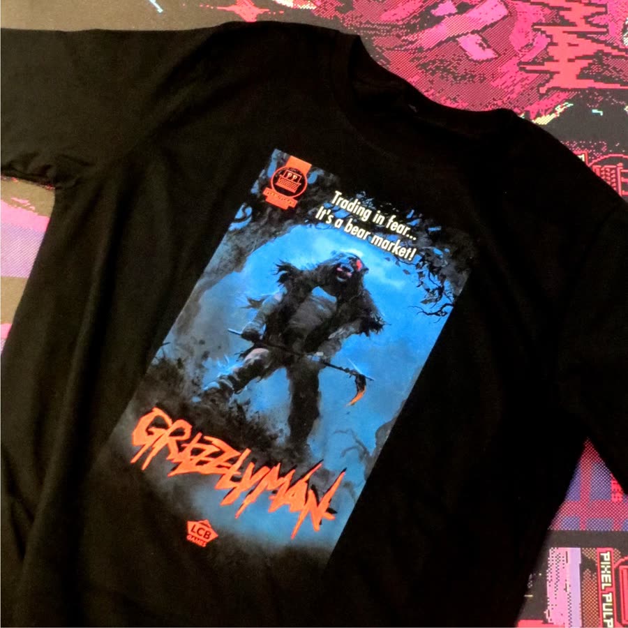 Grizzlyman tee laid flat over Pixel Pulps artwork